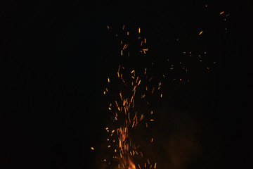 firecamp sparks over night sky
