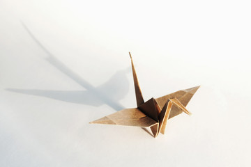 Cute origami art, colored shape object isolated over a white background