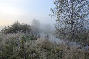 Autumn landscape.Small forest river Torgosha in Moscow region,Russia.