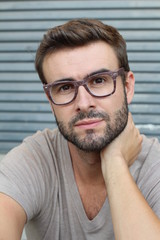 Closeup of gorgeous man wearing eyeglasses