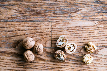 Walnuts on wooden background. Studio shot, copy space.