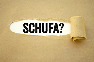 Abgerissenes Papier mit Schufa