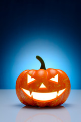 Halloween pumpkin with scary mug