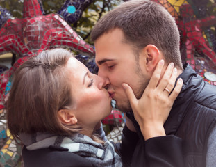 Fototapeta premium fashion of nice pretty young hipster woman with a handsome man kiss
