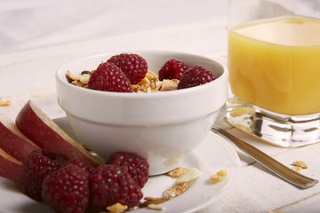 breakfast with cereals, apple, raspberry and orange juice 0707