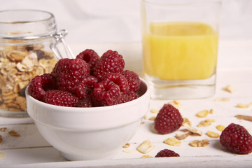 breakfast with cereals raspberry and orange juice 0707