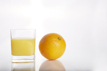 orange and orange juice on white backgraound 1