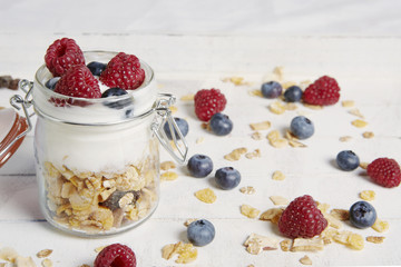 yogurt with raspberries blueberries and cereals 07812
