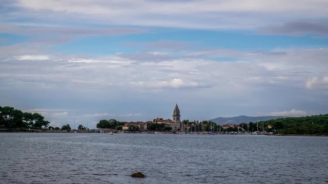 Osor, Croatia - timelapse with sky, sea and floating yachts.Captured opening of unique rotating bridge for traveling yachts through island.