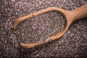 Heathy Chia seeds with wooden spoon