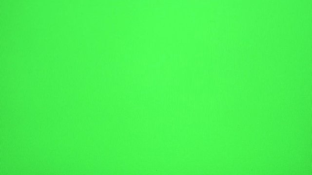 Young Woman Fingers Making Touchscreen Gestures On A Green Screen

