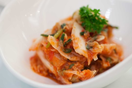 Kimchi (Korean food) close up on white background