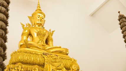Detail of Buddha gold statues decorating the Buddhist temple  in Wat Hin Thaen Lamphachi temple (Temple public) . Kanchanaburi ,Thailand