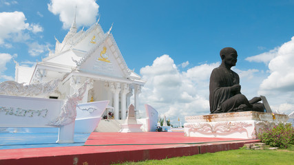  White Vihara hall boat style  in Wat Hin Thaen Lamphachi temple (Temple public) . Kanchanaburi ,Thailand
