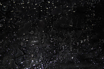 black background, drops of water
