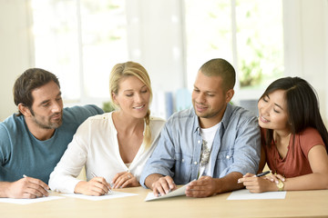 Ethnic people in business room