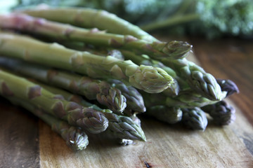 Asparagus on wooden block