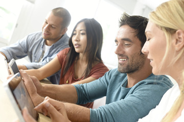 Start-up business people meeting with tablets and smartphones