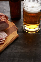 bacon and glass of beer on a table