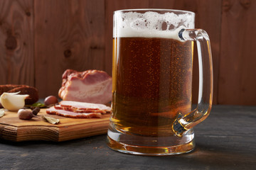 bacon and glass of beer on a table