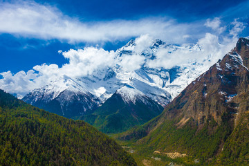 Landscape Snow Mountains Nature Viewpoint.Mountain Trekking Landscapes Background. Nobody photo.Asia Travel Horizontal picture. Sunlights White Clouds Blue Sky. Himalayas Rocks.