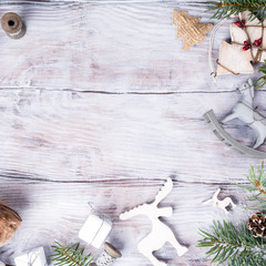 Christmas background with fir tree and decorations. Old wooden board. Top view with copy space for text.