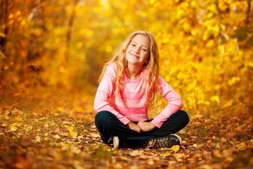 Happy girl at autumn