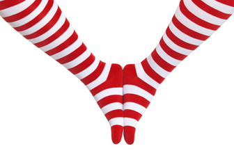 Obraz premium Legs in red and white striped socks isolated on white background