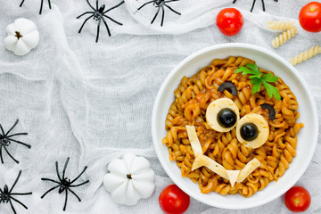 Fototapeta na wymiar Pasta bolognese on Halloween party, fun recipe for kids to dinner