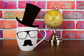 Coffee cup with a black hipster mustache