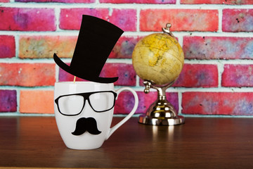 Coffee cup with a black hipster mustache