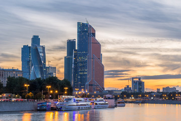Fototapeta na wymiar Moscow City business center and Moscow river on sunset