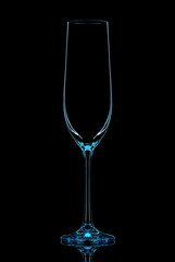 Silhouette of blue champagne glass with clipping path on black background.