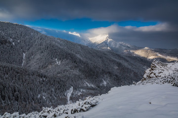 Fototapeta na wymiar Cold dawn in Tatra Mountains at winter, Poland
