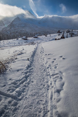 Snowy footpath to the shelter in the mountains at winter, Poland