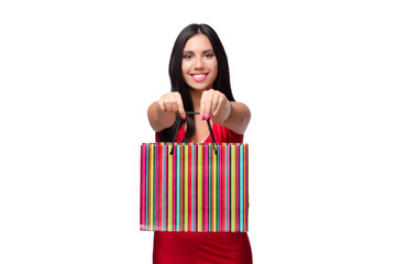 Woman in red dres after shopping isolated on white