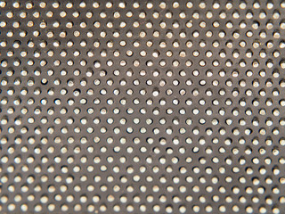 metal studs on a black background