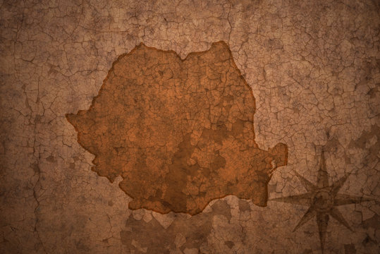 romania map on vintage crack paper background