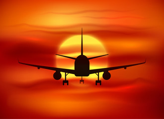 Black vector plane silhouette at red sunset background