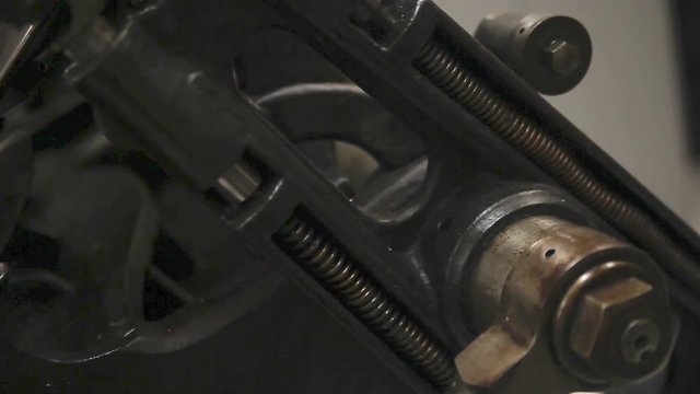 Detail of smoothly running parts of an antique letterpress machine