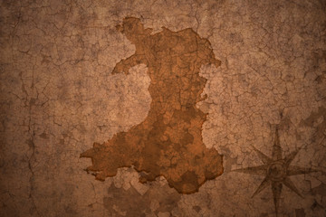 wales map on vintage crack paper background