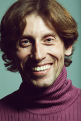 Male beauty concept. Emotional portrait of laughing handsome man