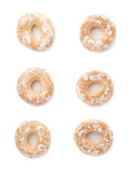 Set of small cakes with hole isolated over the white background