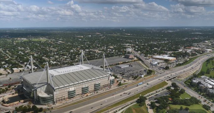An aerial view over the Alamodome and Interstate 37 in San Antonio, Texas.  	