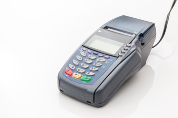 Credit card machine on a white background.