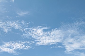 Naklejka na ściany i meble Blue sky background with white cloud, white cloud in the blue sky 