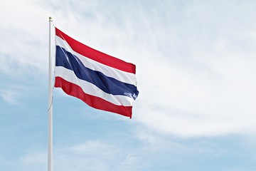 Thailand flag with cloudy blue sky background, Thailand flag waving, Thailand flag blowing the wind