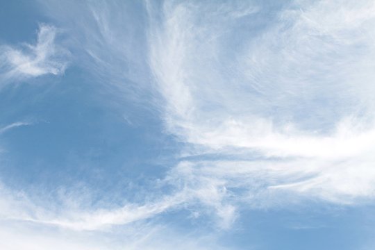 Blue sky background with white cloud, white cloud in the blue sky
