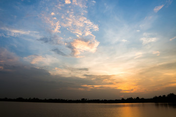 Naklejka premium colorful dramatic sky with cloud at sunset
