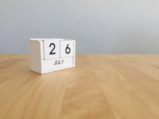 July 26th.July 26 white wooden calendar on vintage wood abstract